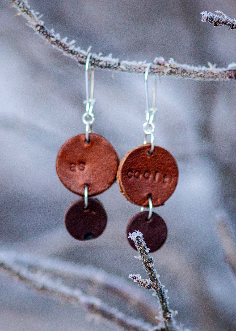 Light weight leather earrings "as coolt"